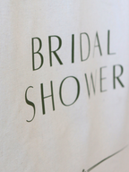 Text 'BRIDAL SHOWER' on a light background