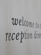 Text 'Welcome to the reception dining' on a light background